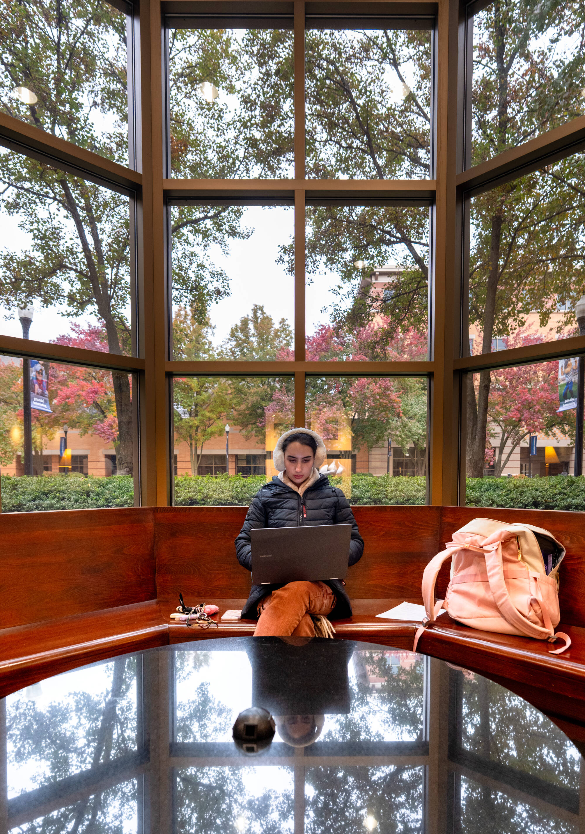 Senior Haley Powers studies in a common area of Richard M. DeVos Center on the Robert C. Pew Grand Rapids Campus. Powers, a senior, is majoring in Cell & Molecular Biology.  2025-11-11. Photography by Steve Jessmore